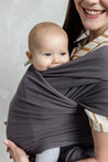 A Boba Classic Baby Wrap, made from a soft 95% French Terry cotton blend and 5% Spandex. Ergonomic, award-winning design fits babies from 7 Ibs to 35 Ibs, best up to 20 Ibs. Machine washable, dryer friendly, and certified hip-healthy. Organic Dark Gray