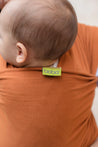 A Boba Classic Baby Wrap, made from a soft 95% French Terry cotton blend and 5% Spandex. Ergonomic, award-winning design fits babies from 7 Ibs to 35 Ibs, best up to 20 Ibs. Machine washable, dryer friendly, and certified hip-healthy. Camel