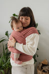 A Boba Classic Baby Wrap, made from a soft 95% French Terry cotton blend and 5% Spandex. Ergonomic, award-winning design fits babies from 7 Ibs to 35 Ibs, best up to 20 Ibs. Machine washable, dryer friendly, and certified hip-healthy. Dusty Pink