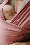 A Boba Classic Baby Wrap, made from a soft 95% French Terry cotton blend and 5% Spandex. Ergonomic, award-winning design fits babies from 7 Ibs to 35 Ibs, best up to 20 Ibs. Machine washable, dryer friendly, and certified hip-healthy. Dusty Pink