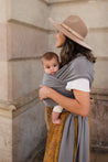 A Boba Classic Baby Wrap, made from a soft 95% French Terry cotton blend and 5% Spandex. Ergonomic, award-winning design fits babies from 7 Ibs to 35 Ibs, best up to 20 Ibs. Machine washable, dryer friendly, and certified hip-healthy. Gray