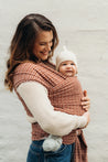 A Boba Classic Baby Wrap, made from a soft 95% French Terry cotton blend and 5% Spandex. Ergonomic, award-winning design fits babies from 7 Ibs to 35 Ibs, best up to 20 Ibs. Machine washable, dryer friendly, and certified hip-healthy. Hali