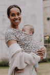 A Boba Classic Baby Wrap, made from a soft 95% French Terry cotton blend and 5% Spandex. Ergonomic, award-winning design fits babies from 7 Ibs to 35 Ibs, best up to 20 Ibs. Machine washable, dryer friendly, and certified hip-healthy. Leopard