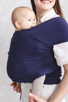 A Boba Classic Baby Wrap, made from a soft 95% French Terry cotton blend and 5% Spandex. Ergonomic, award-winning design fits babies from 7 Ibs to 35 Ibs, best up to 20 Ibs. Machine washable, dryer friendly, and certified hip-healthy. Navy Blue