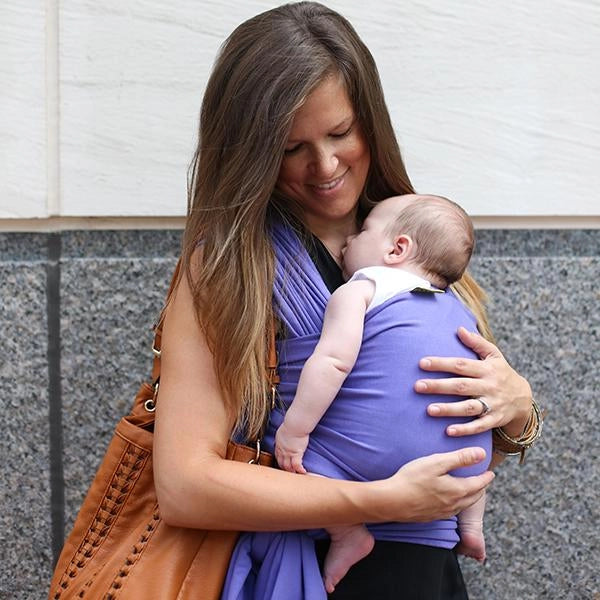 A Boba Classic Baby Wrap, made from a soft 95% French Terry cotton blend and 5% Spandex. Ergonomic, award-winning design fits babies from 7 Ibs to 35 Ibs, best up to 20 Ibs. Machine washable, dryer friendly, and certified hip-healthy.  Purple