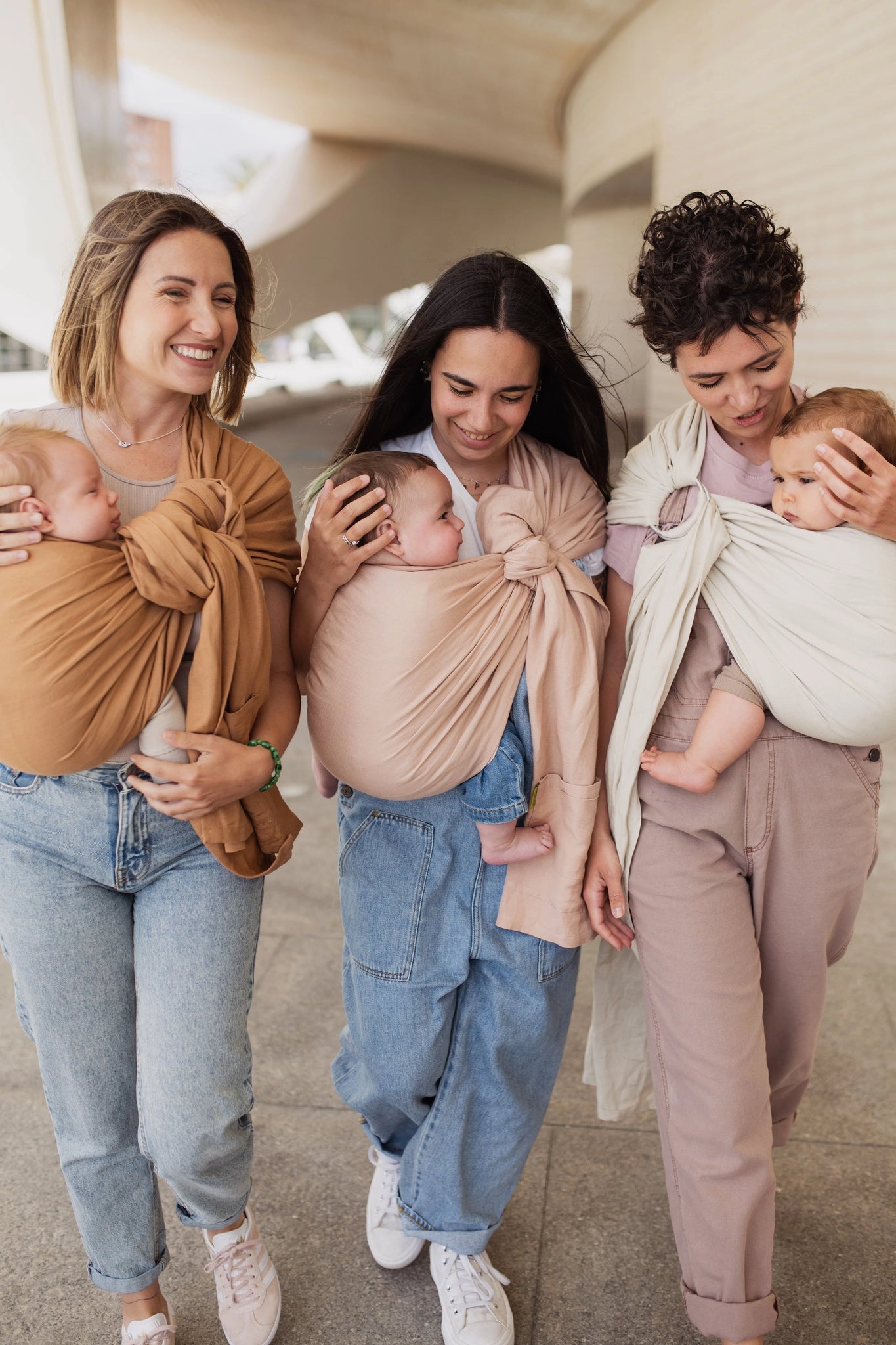 A Boba Ring Sling Baby Carrier made from a unique linen bamboo viscose fabric blend, perfect for all seasons. Lightweight and breathable, it stores compactly, ideal for newborn snuggles to toddler ups and downs (8 - 35Ibs). Pampas Beige