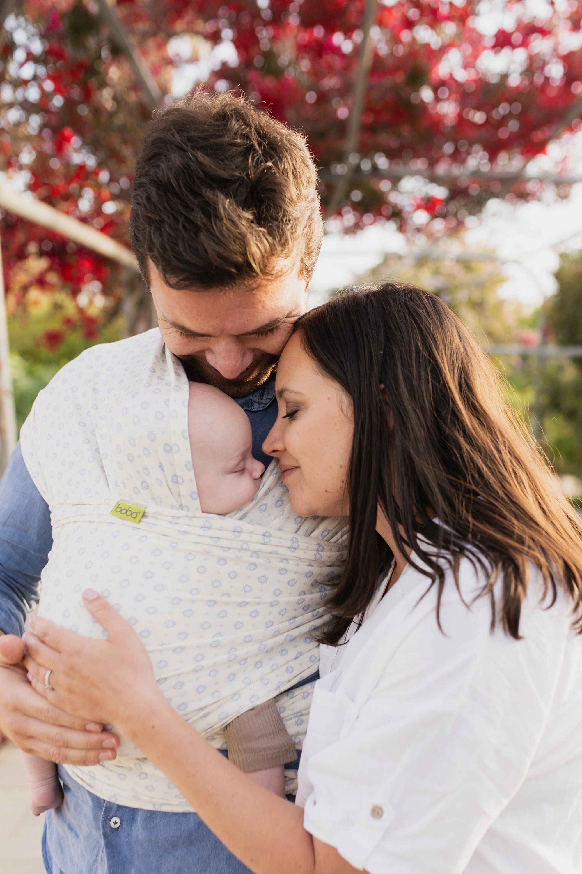 A Boba Serenity Baby Wrap, made from a buttery soft, extra breathable bamboo blend fabric (68% Viscose from Bamboo, 25% Cotton, 7% Spandex). Ergonomic, award-winning design fits babies from 7 Ibs to 35 Ibs, best up to 20 Ibs. Machine washable, dryer friendly, and certified hip-healthy. Anvi