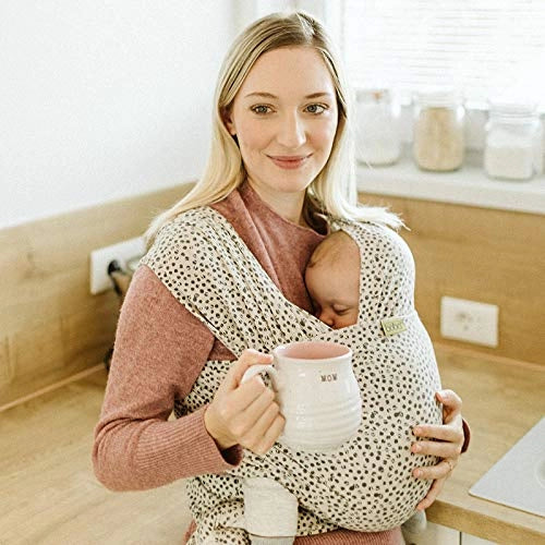 A Boba Serenity Baby Wrap, made from a buttery soft, extra breathable bamboo blend fabric (68% Viscose from Bamboo, 25% Cotton, 7% Spandex). Ergonomic, award-winning design fits babies from 7 Ibs to 35 Ibs, best up to 20 Ibs. Machine washable, dryer friendly, and certified hip-healthy. Cobblestone