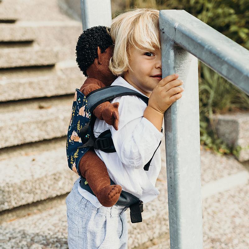 Child wearing a Bear Cub doll Boba Mini Baby Carrier 