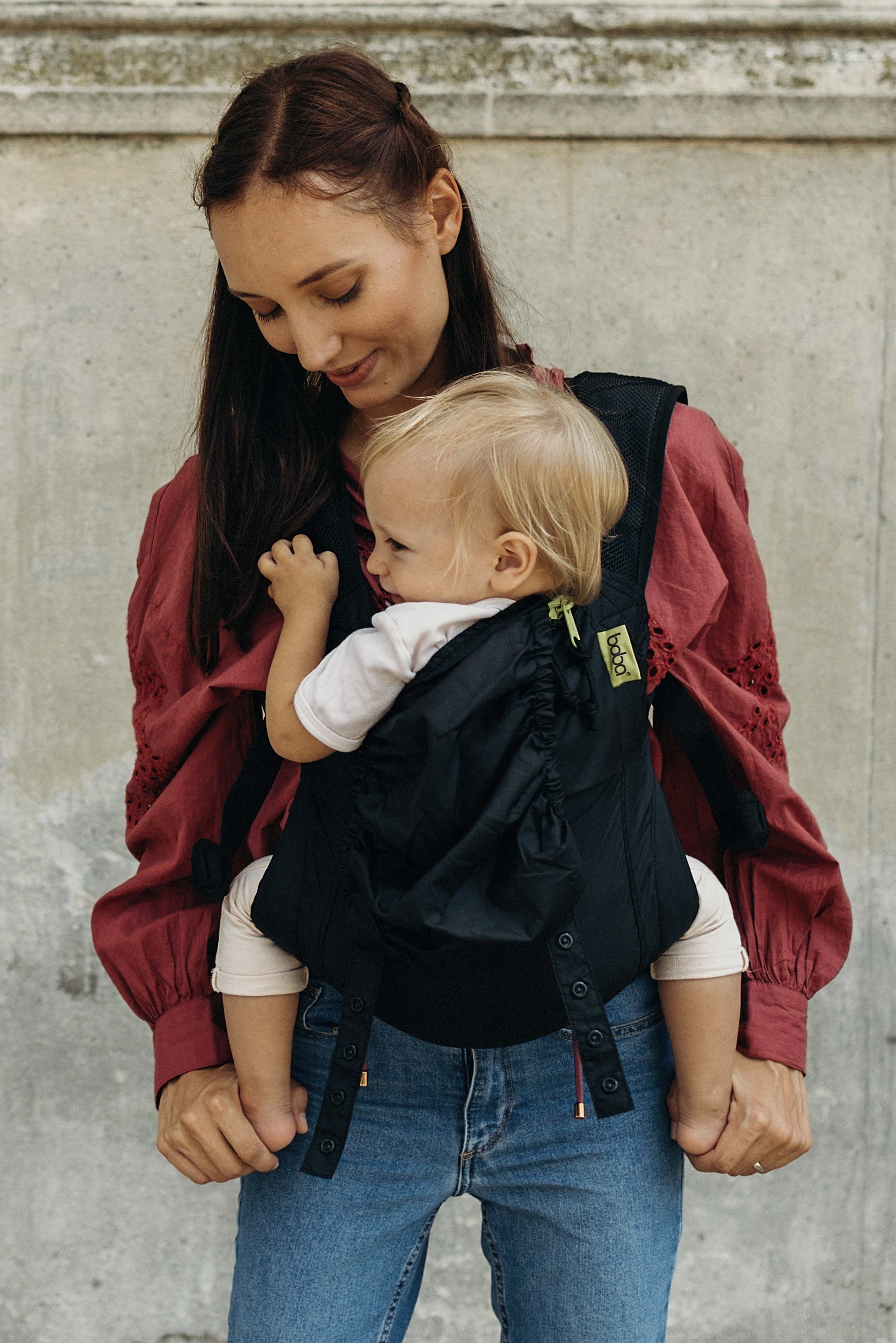 Discover our space-saving and perfectly designed Boba Air Black baby carrier that makes your travels with your little one a breeze! Our ergonomic and lightweight model is designed to carry babies from 4 months up to 45 lbs so you can experience convenience and ease on-the-go!